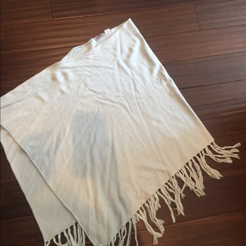 Acrobat poncho with Tassles